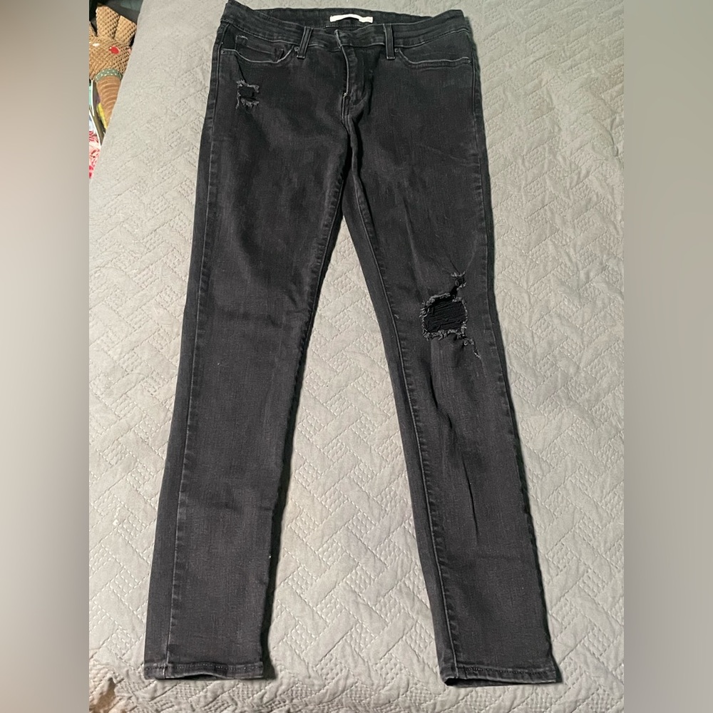 Levi’s 711 Skinny Distressed Black Skinny Jeans